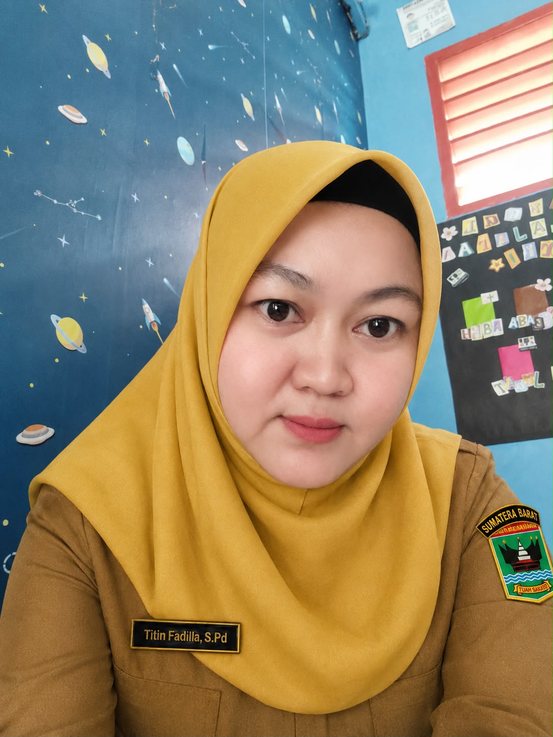 Titin Fadila, S.Pd, Gr